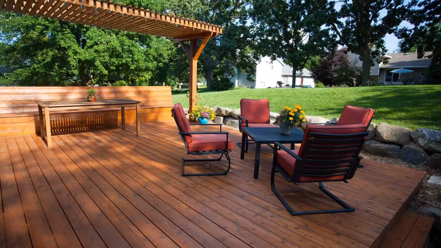 Custom wood decks with premium furniture built by Acumen Renovations in Kansas City